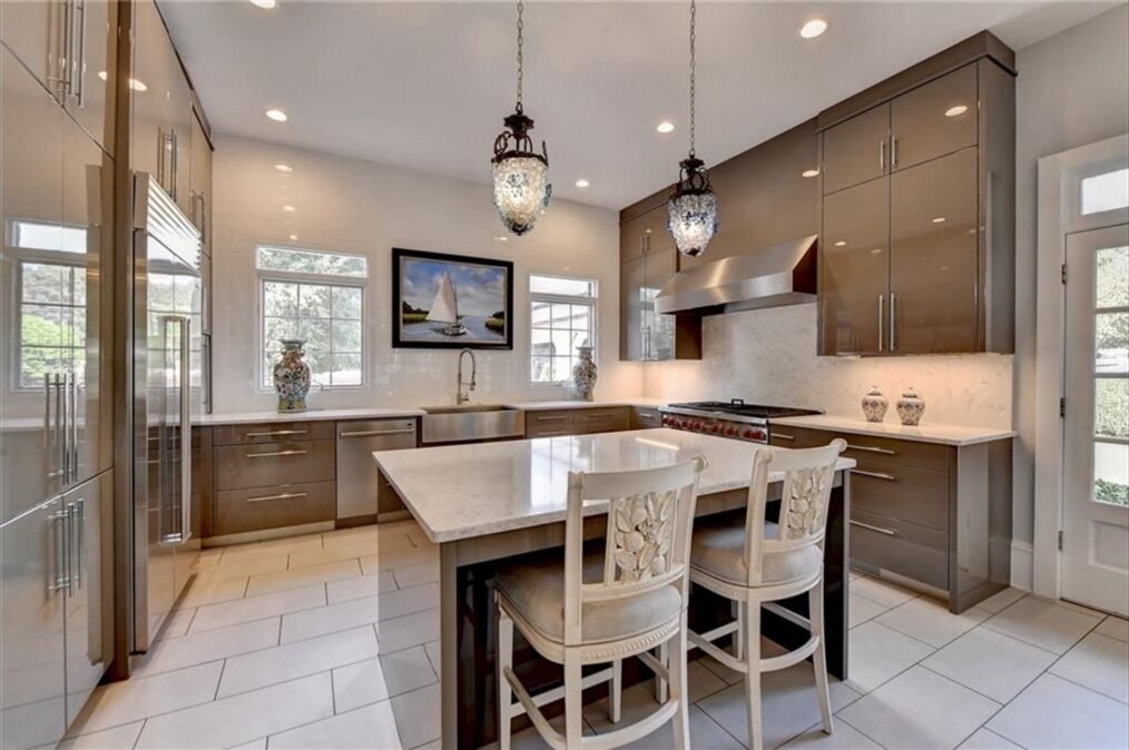 Kitchen before renovation, view across the island