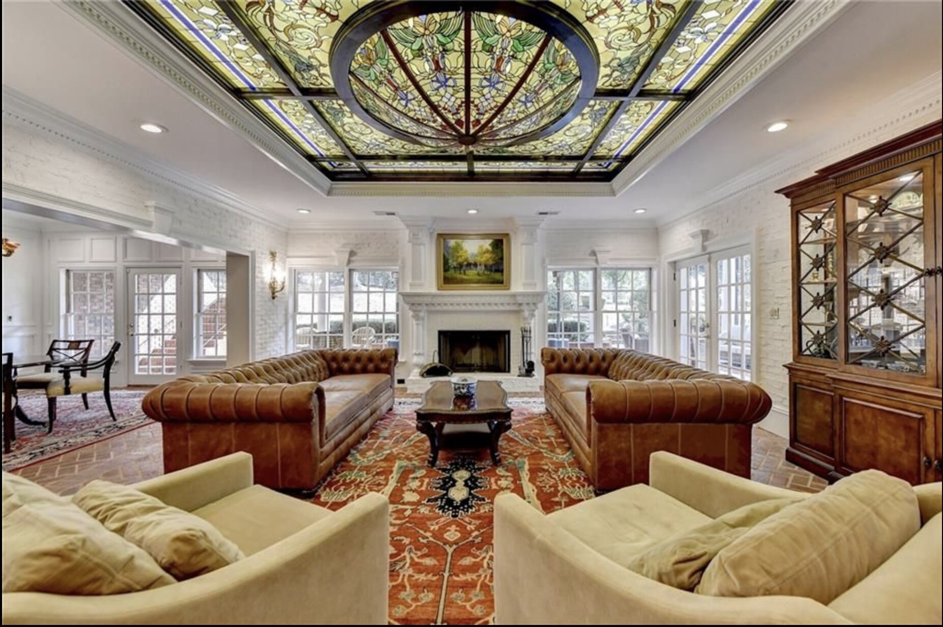 Living room before renovation with stained-glass ceiling